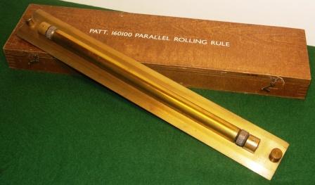 20th century parallel rolling rule, Patt. 160100, made in brass. Complete with original wooden box.