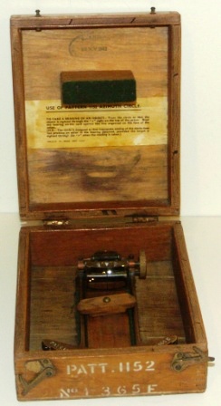 WWII brass Azimuth circle with adjustable prism and filter for compass reading. In original wooden box. Dated November 28, 1942. 