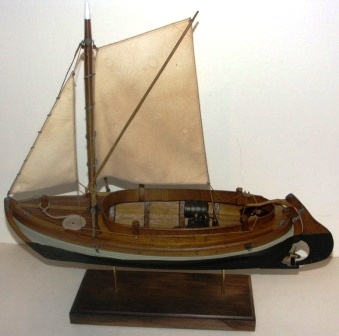 20th century clinker-built and spritsail-rigged open coaster type model equipped with compression-ignition engine.