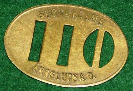 "110 öre check", made in brass, used for travelling with local Stockholm steam ferry