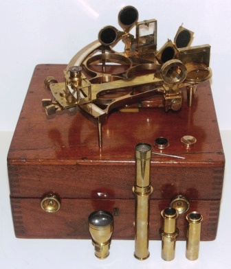 Early 20th century brass sextant No. 13143 made by H. Hughes & Son Ltd. London. Last examined and adjusted November 1920 by the National Physical Laboratory England. Brass circle frame, silver scale, four telescopes and six sun-filters. In original mahogany case (requires minor attention). 