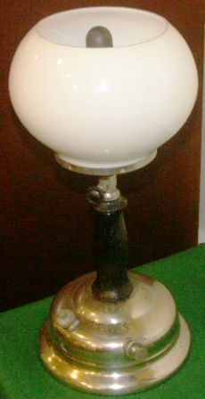 1930' s kerosene table lamp. Chrome-plated, wooden handle and opal glass. Made in Sweden by Primus.