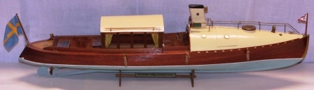 20th century built model depicting a saloon boat launched 1908 by Reversator Shipyard Sweden and flying the KSSS (Royal Swedish Yacht Club) standard. Please note last photo of "bottoming". 