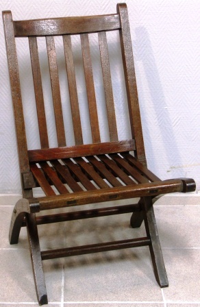 Small folding deck chair made of teak from S.S. Mauretania by Hughes Bolckow Ltd. Blyth, Northumberland