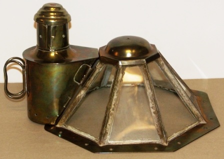 Late 19th century octagonal brass binnacle hood, complete with detachable kerosene lantern. 