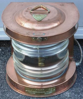 20th century electrified copper masthead light. Made by Rosengrens Bleckslageri AB, Malmö Sweden. Marked with three crowns and Register No. St 28104. 