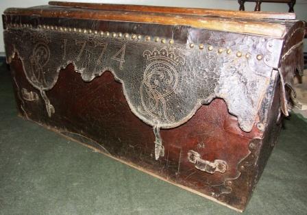 18th century leather bound travellers' trunk. Dated 1774 and marked with crowns and the initials CR.