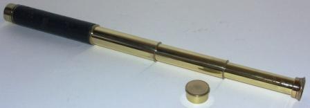 Early 20th century hand-held refracting telescope made by Denhill. Model: Venus 18x.With three brass draws and leather bound tube.
