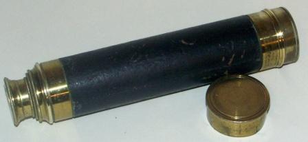 19th century hand-held refracting telescope, maker unknown. With two brass draws and leather and brass bound tube. 